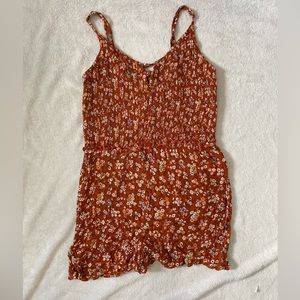 Orange floral romper